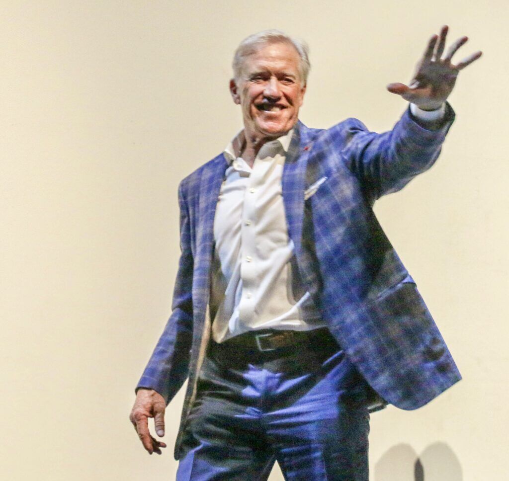John Elway leaves the stage of the Ellie Caulkins Opera House on Nov. 8, 2025, after the Denver Film Festival's world-premiere screening of the new Netflix documentary 'Elway.' (John Moore, The Denver Gazette)