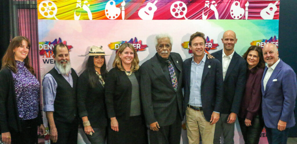 Purnell Steen poses with Denver Mayor Mike Johnston and other area arts leaders at the promotional launch of Denver Arts Week on Nov. 1, 2024, at Dazzle Denver. (John Moore, Denver Gazette)