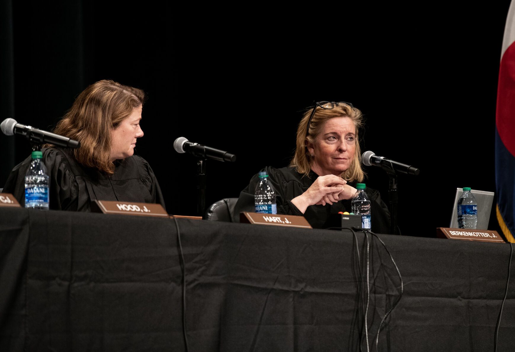 FILE PHOTO: Colorado Supreme Court Justice Maria E. Berkenkotter, right, asks a question during a court session held at Pine Creek High School in Colorado Springs on Nov. 17, 2022.