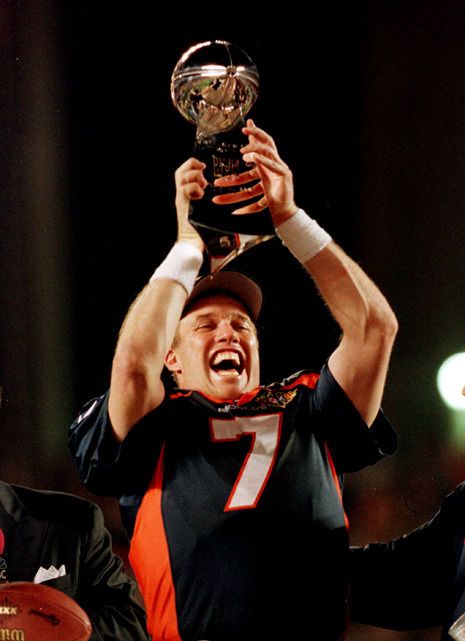 Denver quarterback John Elway hoisted the Vince Lombardi trophy in 1998 after leading the Broncos in their first Super Bowl victory in five tries. (Mark Reis, The Gazette)