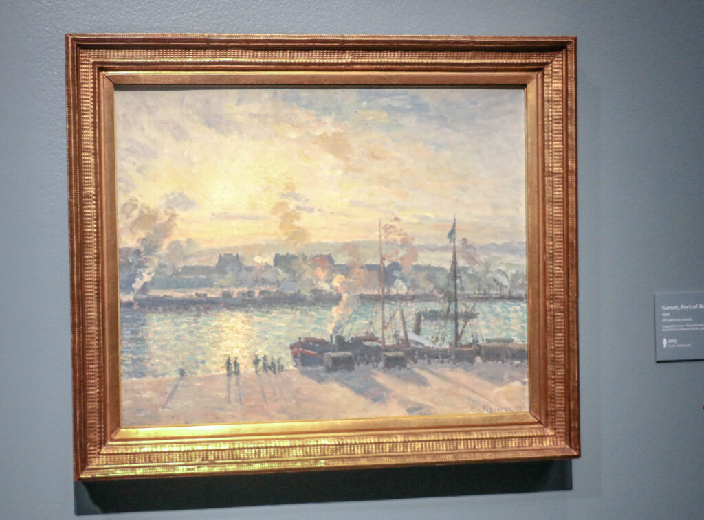 French Impressionist painter Camille Pissarro's 'Sunset, the Port of Rouen (Steamboats)' on Oct. 24, 2025, at the Denver Art Museum. (John Moore, Denver Gazette)