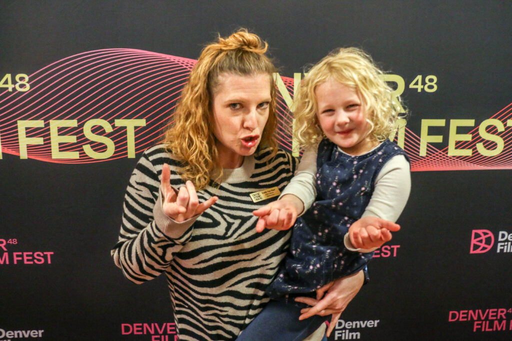 Creede Repertory Theatre Artistic Director Emily Van Fleet and her kiddo at the Denver Film Festival's screening of the documentary 'Creede U.S.A.' on Nov. 4, 2025, at the Holiday Theater. (John Moore, The Denver Gazette)
