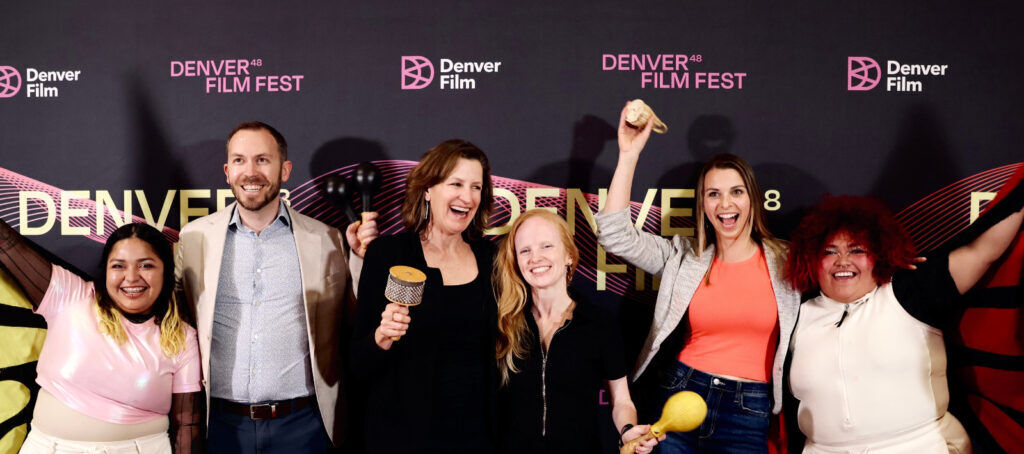 The team from the Colorado-produced documentary 'Comparsa' at a Denver Film Festival screening on Nov. 3, 2025 at the Holiday Theater. (Sydney Dondes for Denver Film)