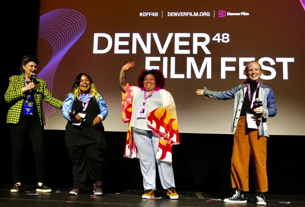 Denver Film moderator Eileen O’Brien, left, 'Comparsa' subjects Lupe and Lesli Perez, and producer Anna Hadingham at 2025 Denver Film Festival screening on Nov. 3 at the Holiday Theater. (John Moore, Denver Gazette)