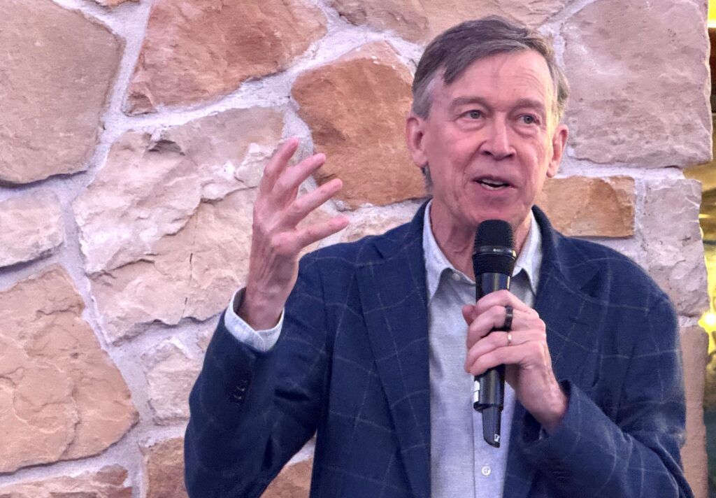 U.S. Sen. John Hickenlooper, a Colorado Democrat, speaks at the Jefferson County Democrats' annual fundraising dinner on Sept. 28, 2025, in Lakewood. (Ernest Luning/Colorado Politics)