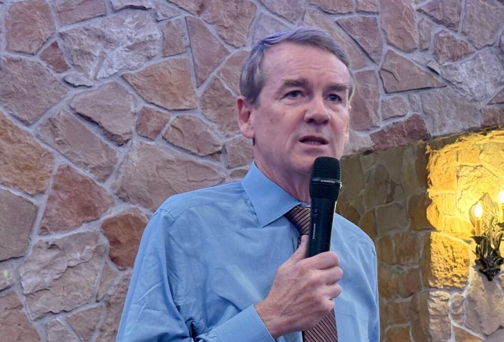 U.S. Sen. Michael Bennet, a Colorado Democrat, addresses the crowd at a Jefferson County Democratic Party fundraiser on Sunday, Sept. 28, 2025, in Lakewood. (Ernest Luning/Colorado Politics)