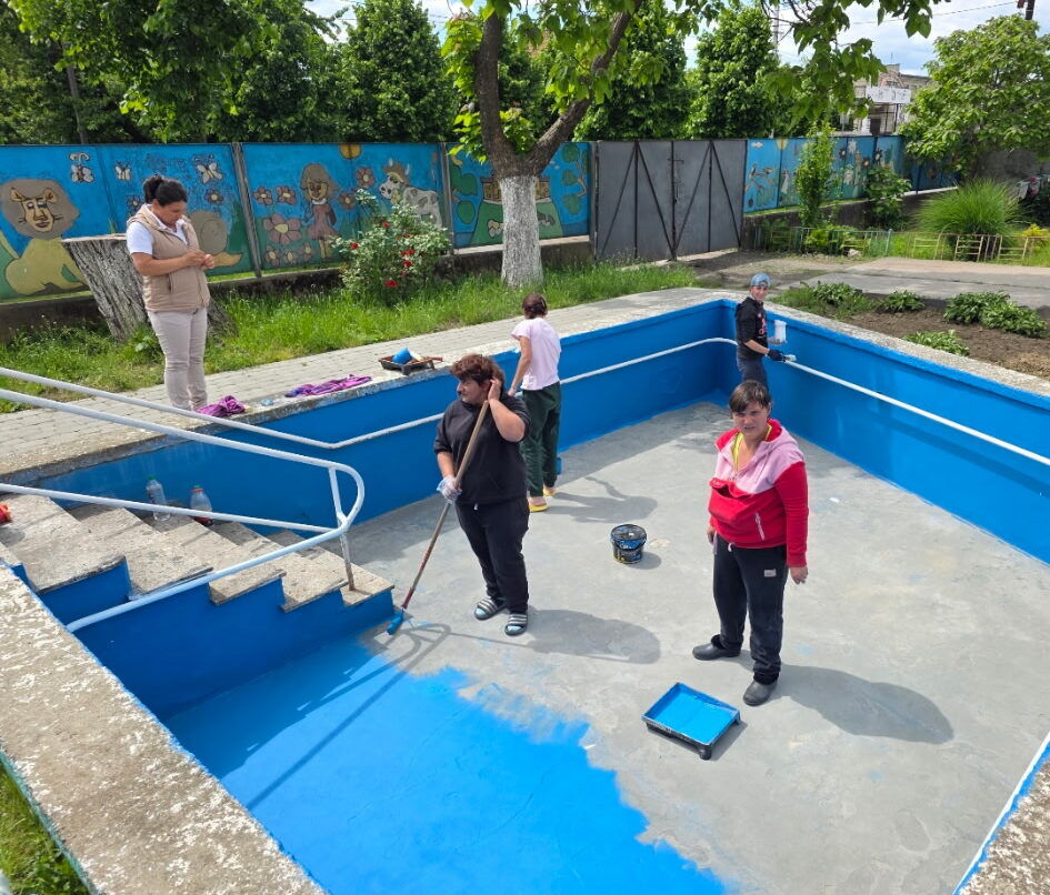 John Babiak helped to paint a pool at an orphanage in Ukraine. 