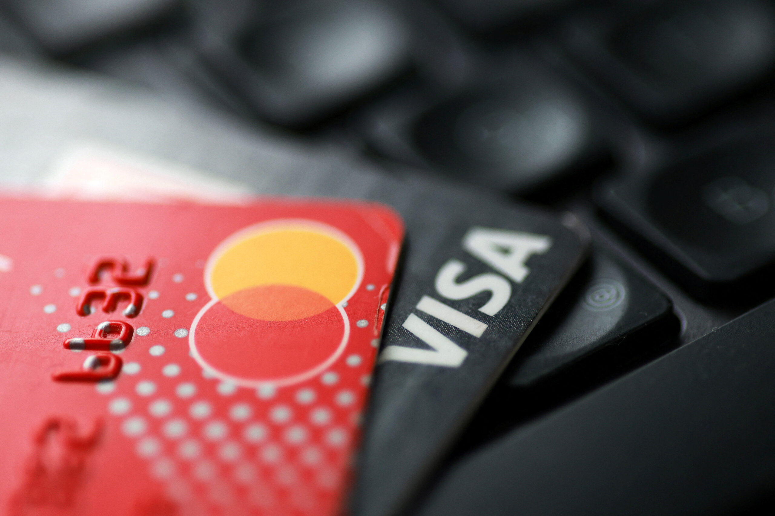 Visa, Mastercard reach revised swipe fee settlement with merchants