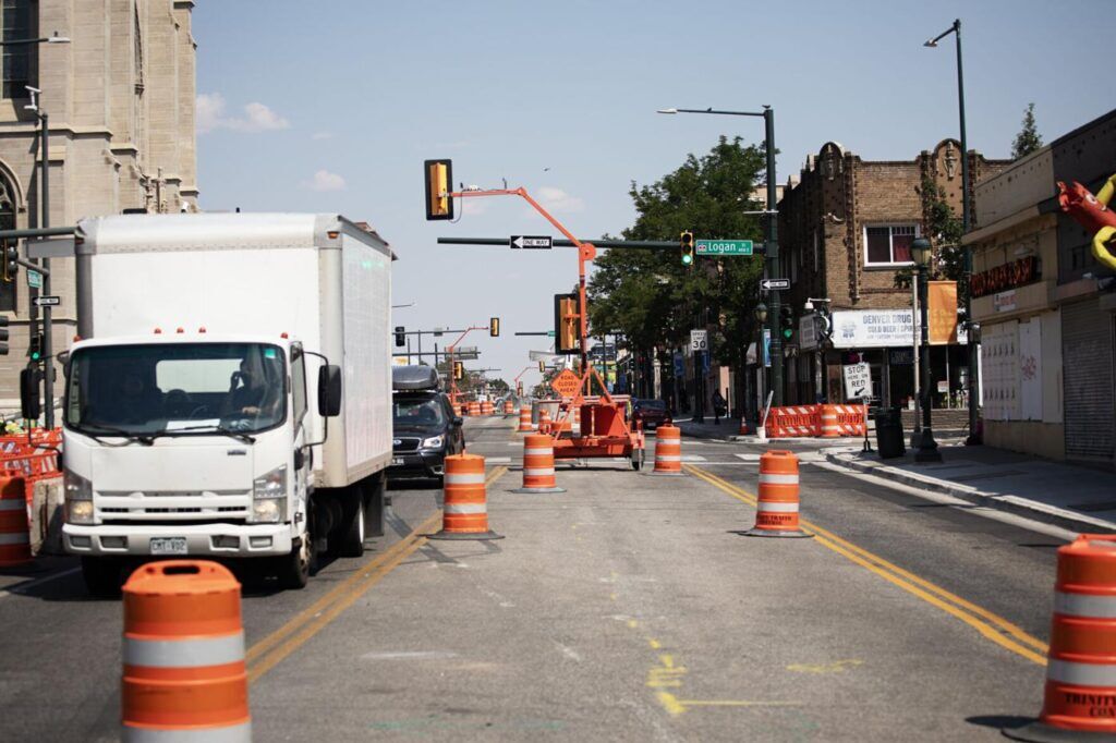 traffic moving slowly along a road with construction