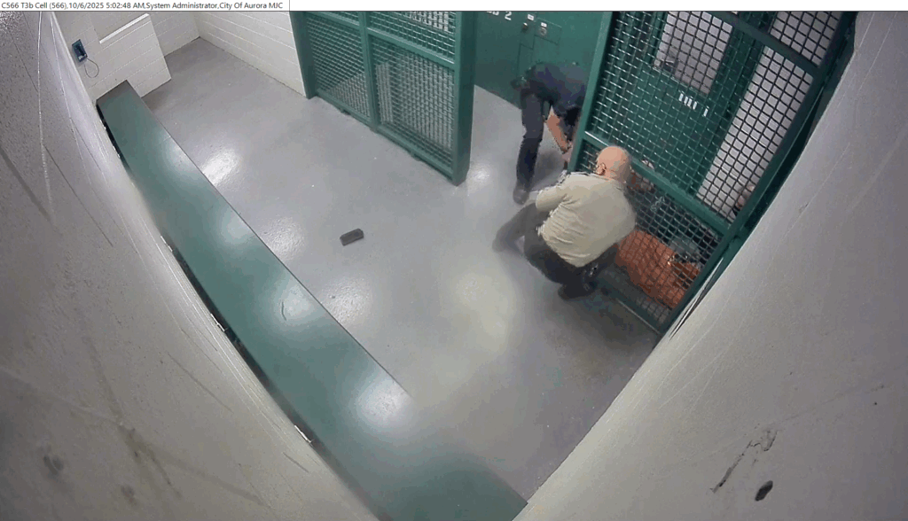 Security camera footage of people in a jail cell