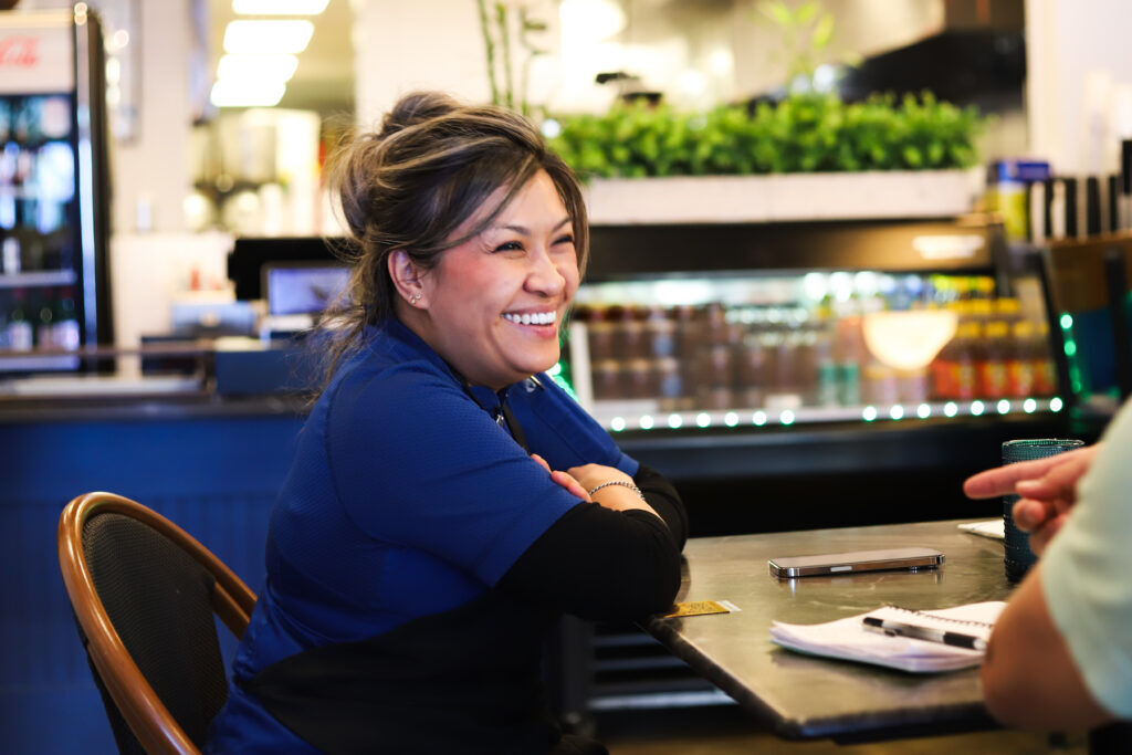 An Nguyen smiles during a business meeting in her Vietnamese restaurant, Dan Da.