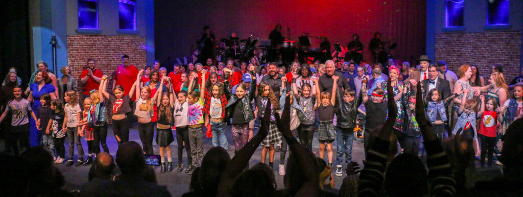 Curtain call for Magic Moments' annual show at Kent Denver School on March 30, 2025. The cast had 112 performers, including former University of Colorado football star Ed Reinhardt. Photo taken March 30, 2025. (John Moore, Denver Gazette)