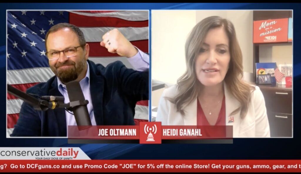 Podcast host Joe Oltmann, left, pumps his fist in reaction to a point made by 2022 Colorado Republican gubernatorial nominee Heidi Ganahl, who welcomed Oltmann's endorsement on Nov. 7, 2022. (Screengrab via Conservative Daily)