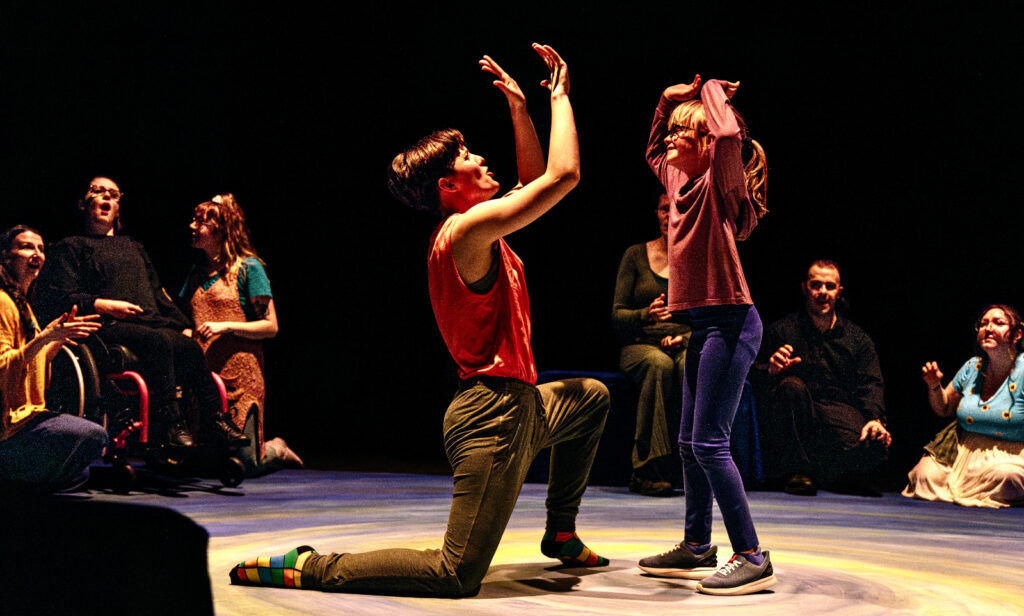 Phamaly Theatre Company actor Vin Ernst works as a guide for a young participating audience member performing in Shakespeare's 'Pericles.' (RDG PHOTOGRAPHY)