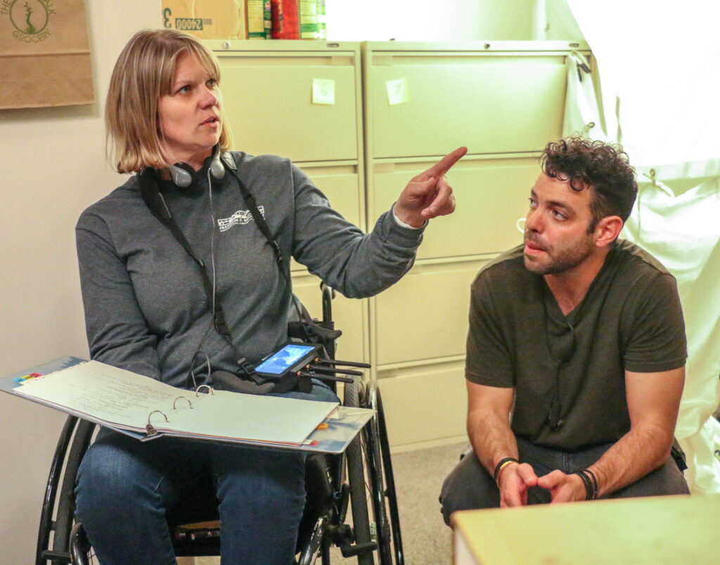 Director Regan Linton calls the shots (literally) for the new short film 'Jack and the Beanstalk,' filmed largely in Denver's Sakura Square. With her is Fredo Jones, director of photography. The film is now airing on Max. (John Moore, Denver Gazette)
