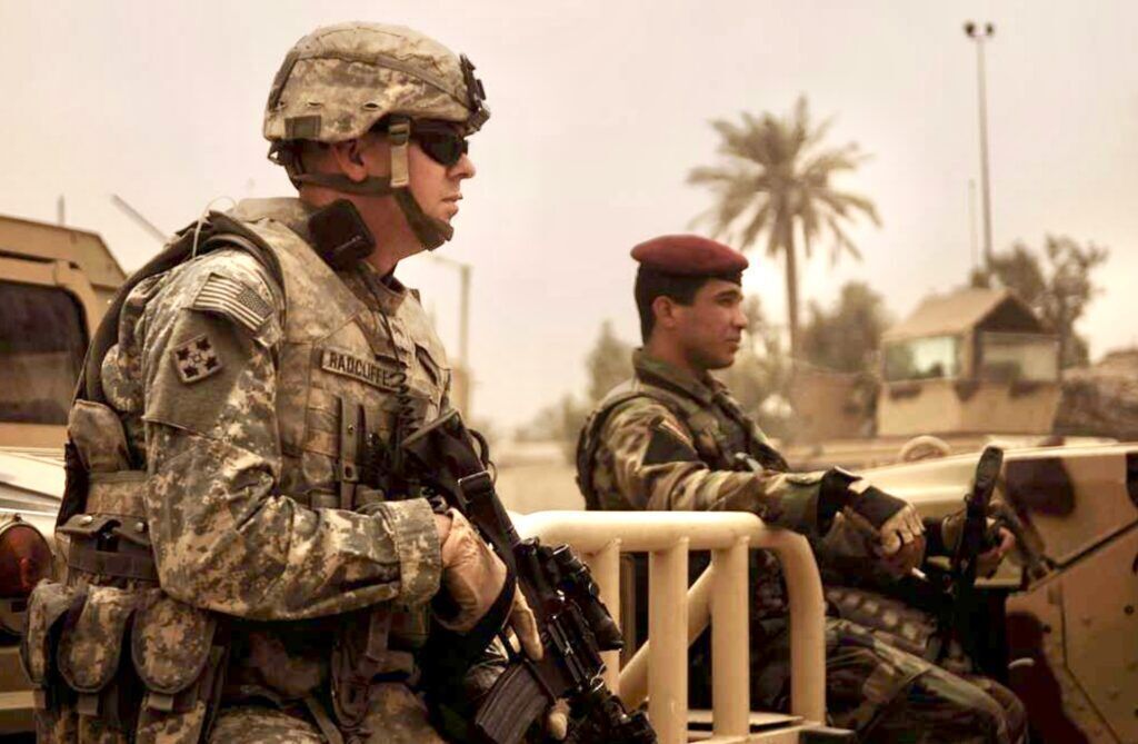 Sgt. Matt Radcliffe, a native of Conroe, Texas, assigned to 3rd Special Troops Battalion, 3rd Brigade Combat Team, 4th Infantry Division, Multi-National Division - Baghdad, provides security during a patrol in the Adhamiyah District of Baghdad. (U.S. Air Force photo/Tech. Sgt. William Greer)