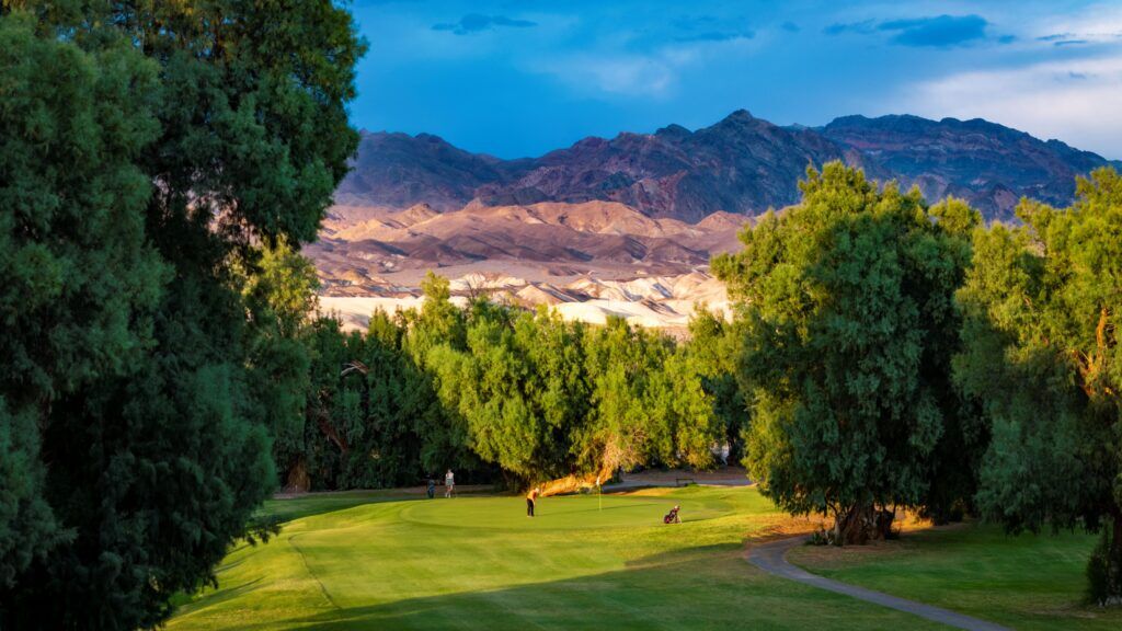 Golfers on the green at The Furnace Creek Golf Course at Death Valley
