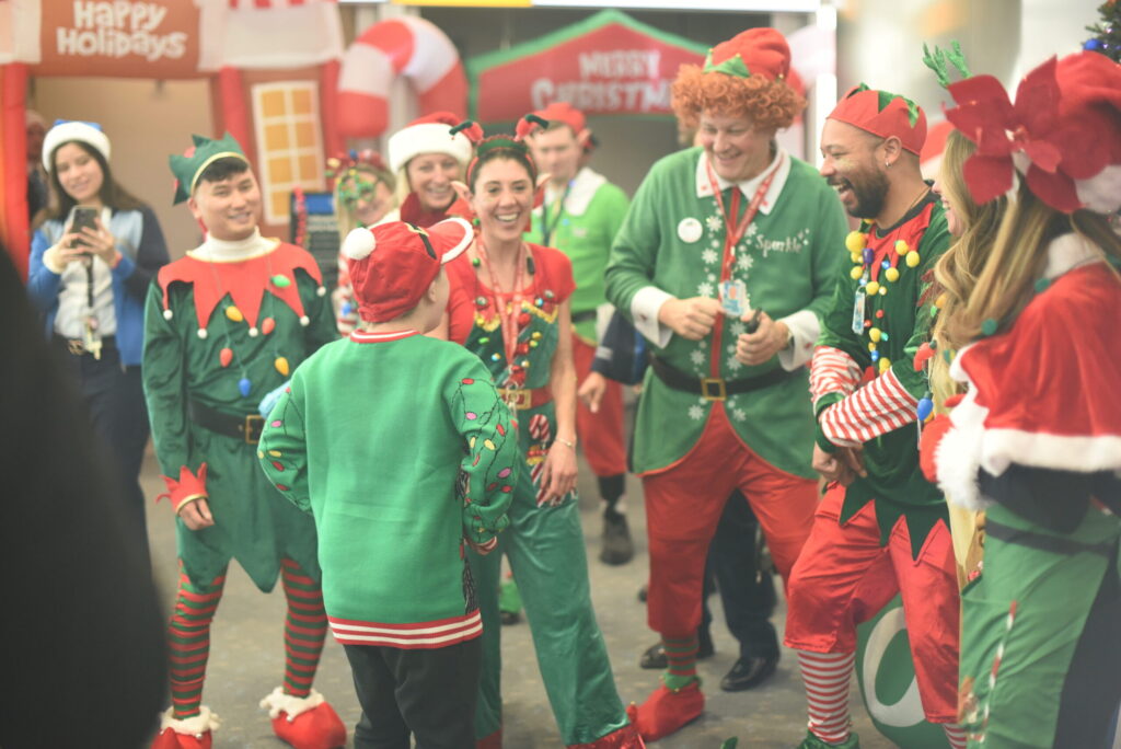 Children revel in holiday spirit during United Airlines annual ‘North Pole’ flight