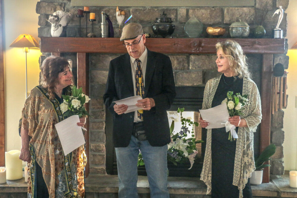 Drake Johnson presides over the wedding of Wendy Ishii, left, and Deb 'Bo' Dimon on Jan. 4, 2026, in Laporte. (John Moore, Denver Gazette)