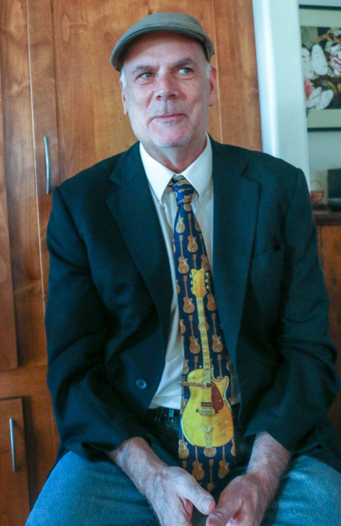 Fort Collins musician Drake Johnson presided over the wedding of Wendy Ishii and Deb 'Bo' Dimon on Jan. 4, 2026, in Laporte. (John Moore, Denver Gazette)