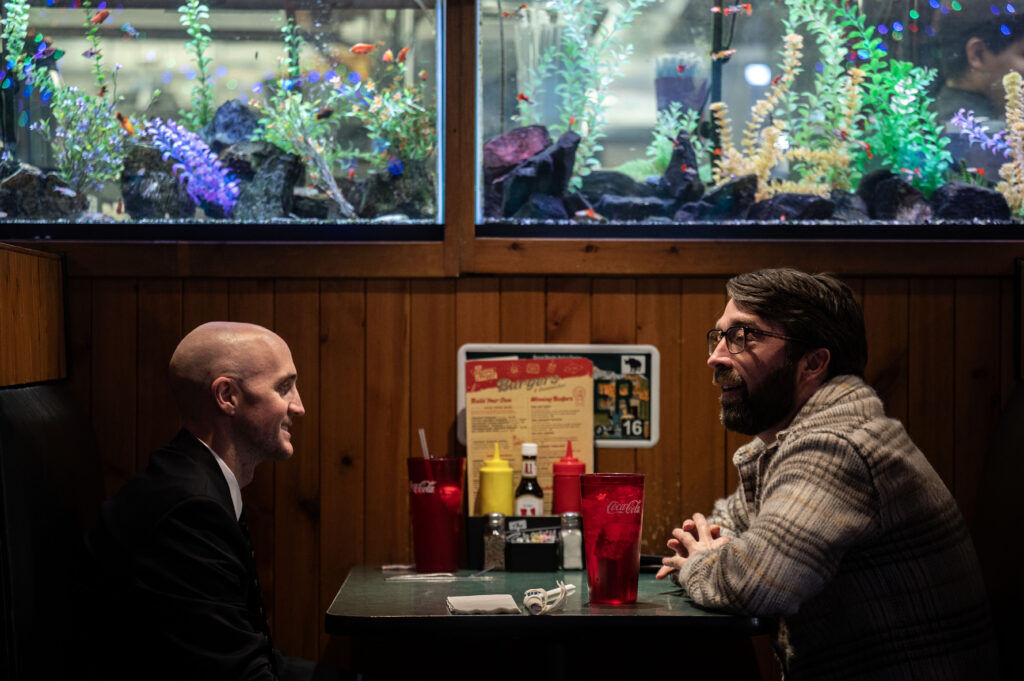 Jared Bell, left, and Padraic McConville have lunch at the Cherry Cricket in Cherry Creek on Friday, Dec. 12, 2025.(Stephen Swofford, Denver Gazette)