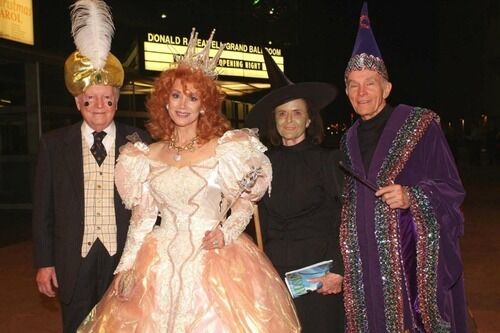 Daniel L. Ritchie, right, dressed as a jester for an opening night at the Denver Center for the Performing Arts, with, including DCPA founder Donald R. Seawell, left, and trustee Judy Wolf. (Courtesy photo, Denver Center for the Performing Arts)