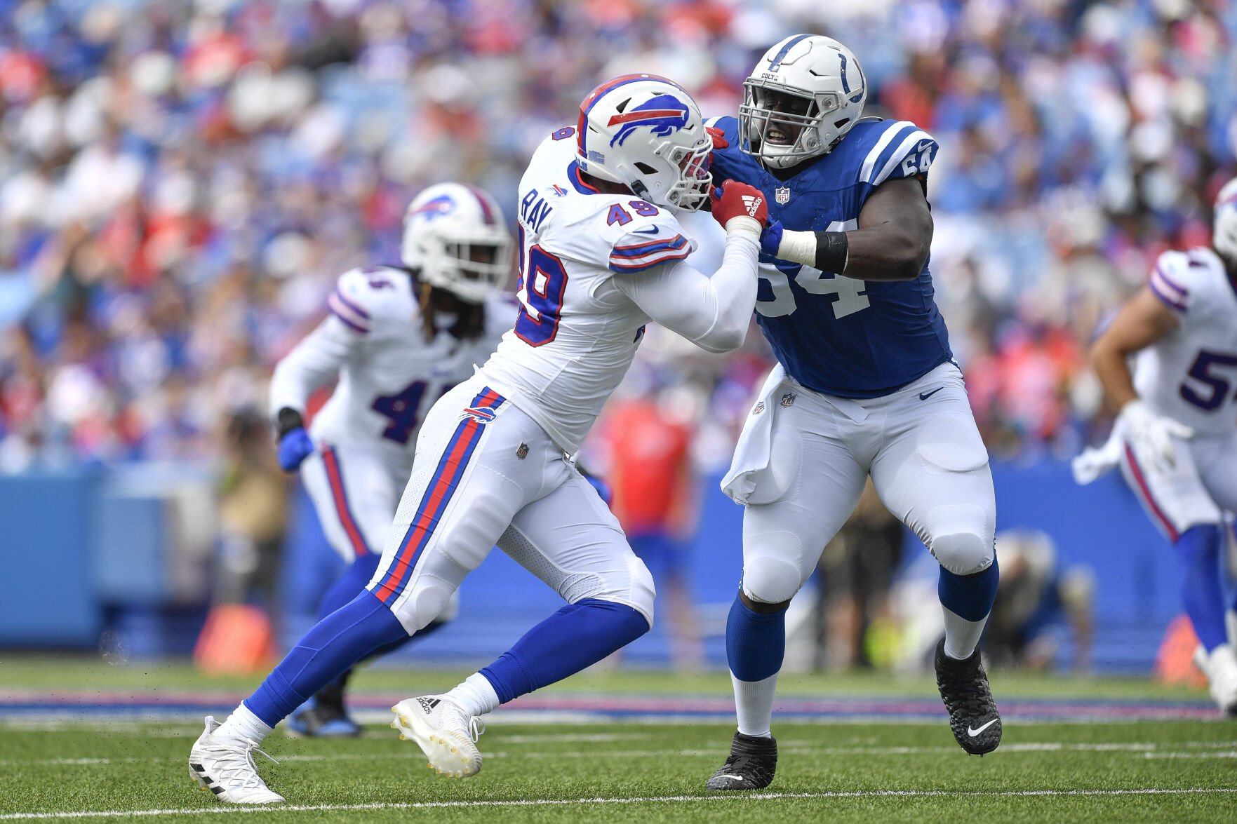 Indianapolis Colts guard Arlington Hambright, right, blocks against Buffalo Bills linebacker Shane Ray during the second half an NFL preseason football game in Orchard Park, N.Y., Saturday, Aug. 12, 2023. (AP Photo/Adrian Kraus) (Adrian Kraus)