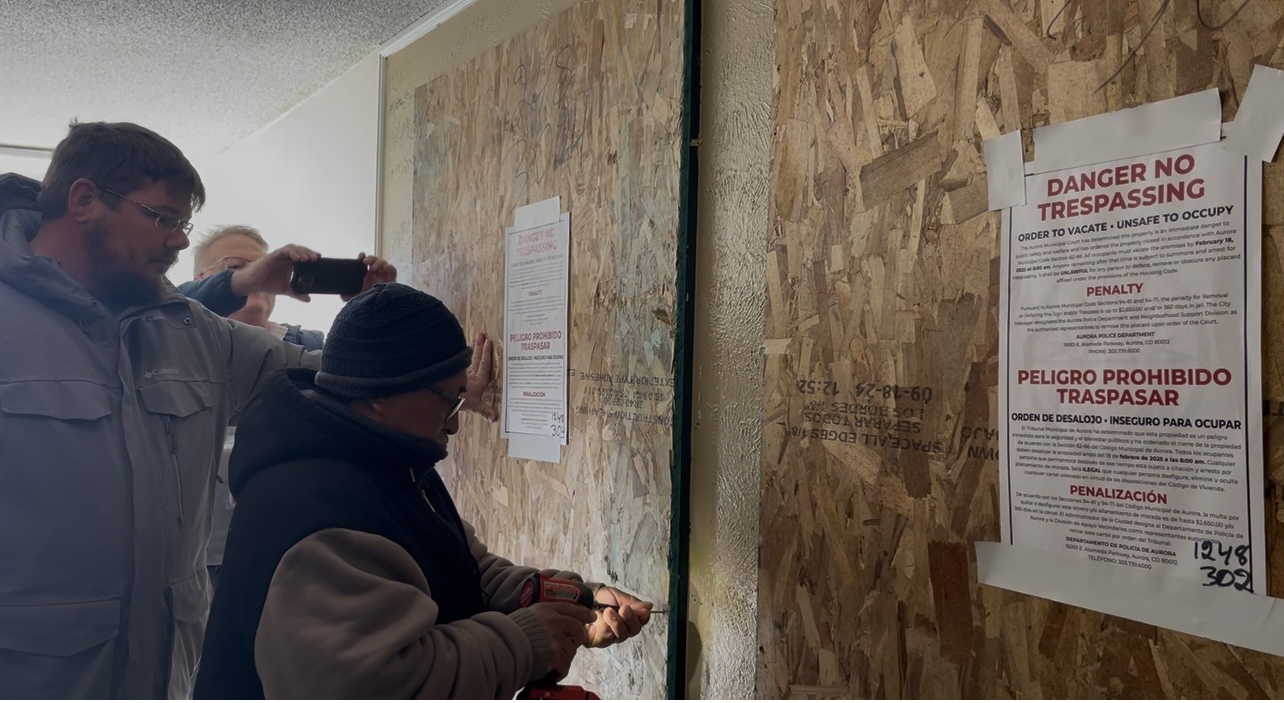 Aurora city officials board up the last unit at the Edge at Lowry on Feb. 19, 2025 as part of a strategy to root out the Venezuelan prison gang Tren de Aragua (TdA), which had taken over the complex. (Nicole C. Brambila
nico.brambila@denvergazette.com)