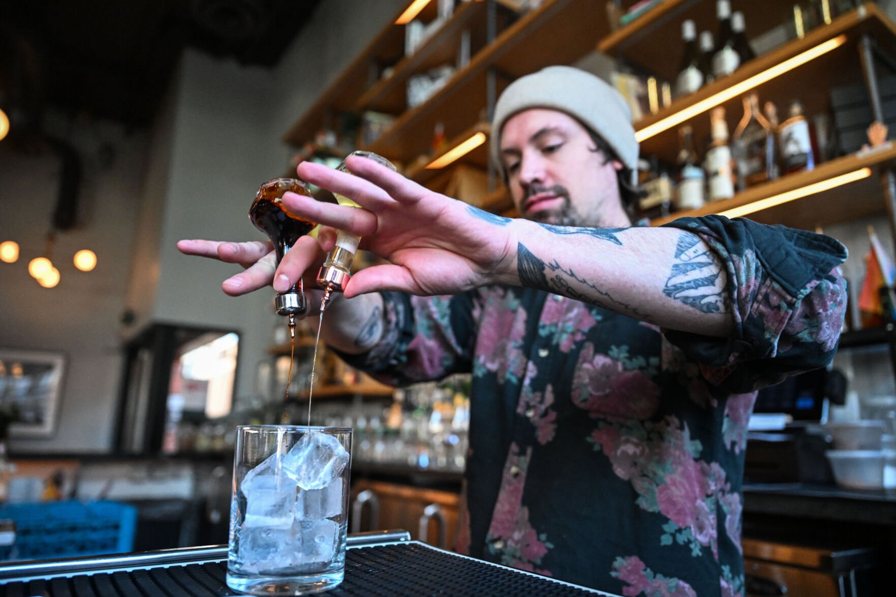 Alex Caffery, a bartender at The Greenwich, makes an Old Fashioned for a customer during a shift in RiNo on Feb. 28. (Stephen Swofford, the Denver Gazette)