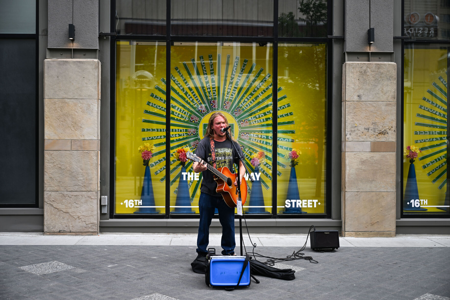 Greg Porch busks on 16th street on Tuesday, July 29, 2025. (Stephen Swofford, Denver Gazette) (Stephen Swofford)