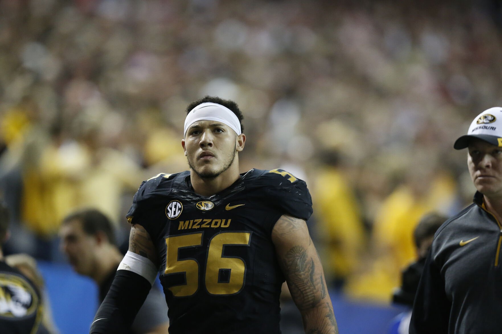 Missouri defensive lineman Shane Ray (56) walks off the field after being ejected from the game for a late hit against Alabama quarterback Blake Sims during the first half of the Southeastern Conference championship NCAA college football game, Saturday, Dec. 6, 2014, in Atlanta. (AP Photo/Brynn Anderson) (Brynn Anderson)