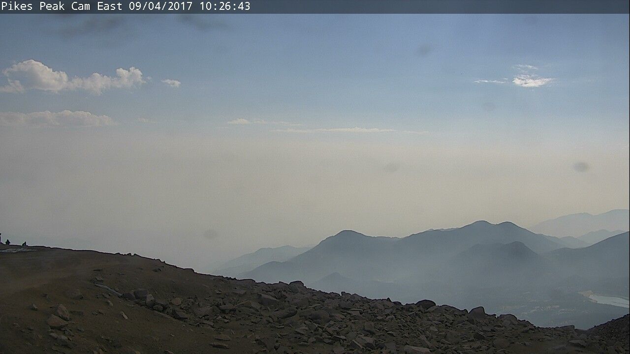View from Pikes Peak summit on Monday morning, September 4, 2017. The haze over Colorado Springs is smoke blowing in from massive wildfires in Wyoming, Montana and Oregon.