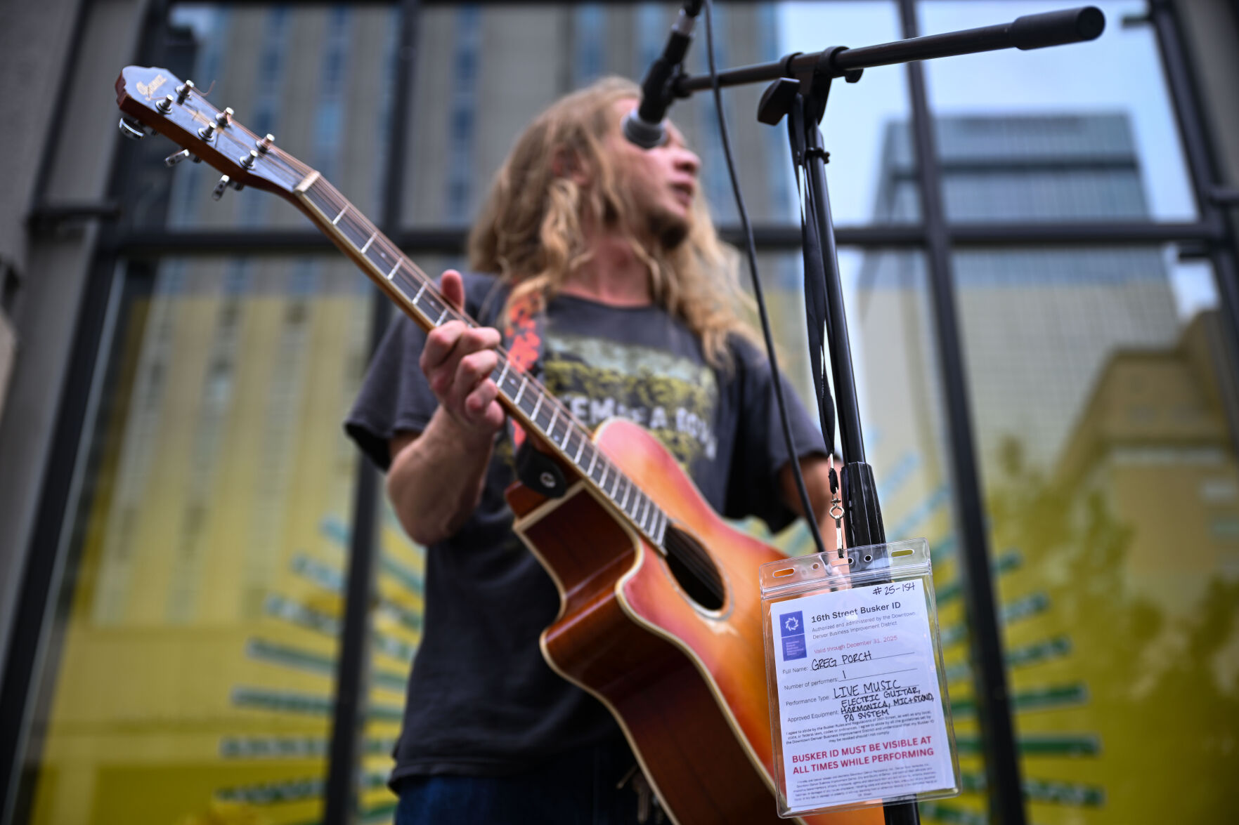 Greg Porch busks on 16th street on Tuesday, July 29, 2025. (Stephen Swofford, Denver Gazette) (Stephen Swofford)