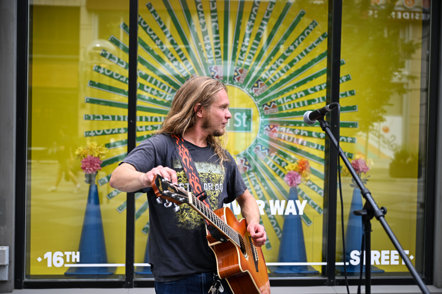 Greg Porch busks on 16th street on Tuesday, July 29, 2025. (Stephen Swofford, Denver Gazette) (Stephen Swofford)