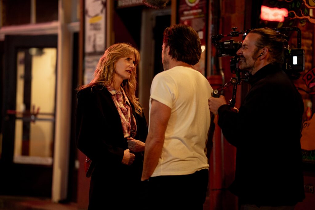 Laura Dern and Will Arnett with director Bradley Cooper of 'Is This Thing On?' (Searchlight Pictures/Jason McDonal)