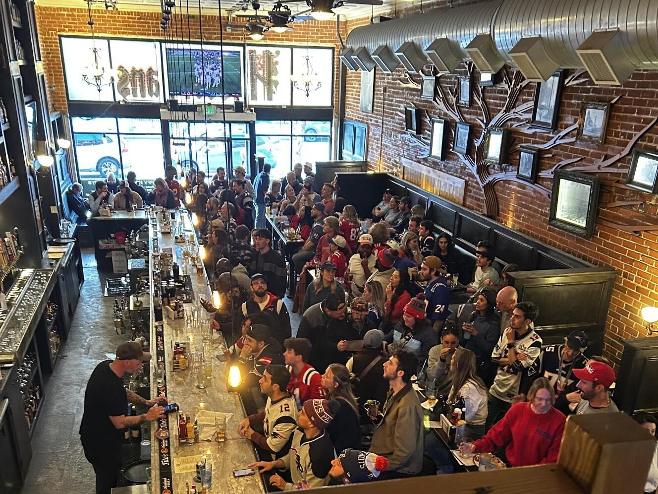 In an enemy bubble: Broncos fan co-owner of Broadway Patriots bar prepares for ‘rowdy’ game day