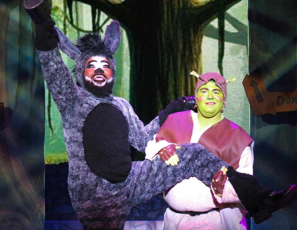 Moses Brown as Donkey with Cooper Kaminsky in the title role in 'Shrek,' presented by Parker Arts and Sasquatch Productions through Feb. 8. (Photo by Becky Toma)