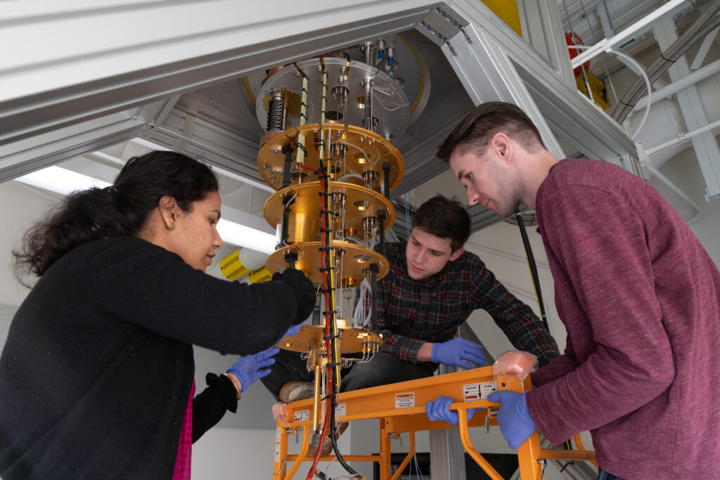 PHd students at the Colorado School of Mines works on a dilution refrigerator in one of the quantum labs on university's campus. The school is expanding its quantum program to bachelor's degree students. (Courtesy photo, Colorado School of Mines)