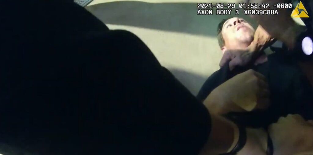 Andru Kulas is on the sidewalk moments before Fort Collins Officer Kevin Park sprays him with pepper spray, as seen through body-worn camera footage. Source: https://www.youtube.com/watch?v=FLWJ1euDi9c