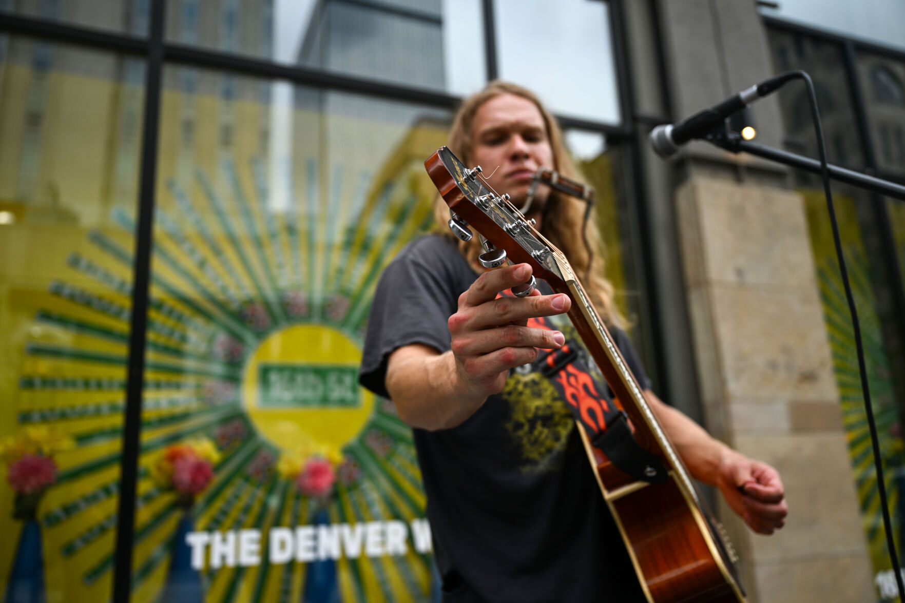 Greg Porch busks on 16th street on Tuesday, July 29, 2025. (Stephen Swofford, Denver Gazette) (Stephen Swofford)