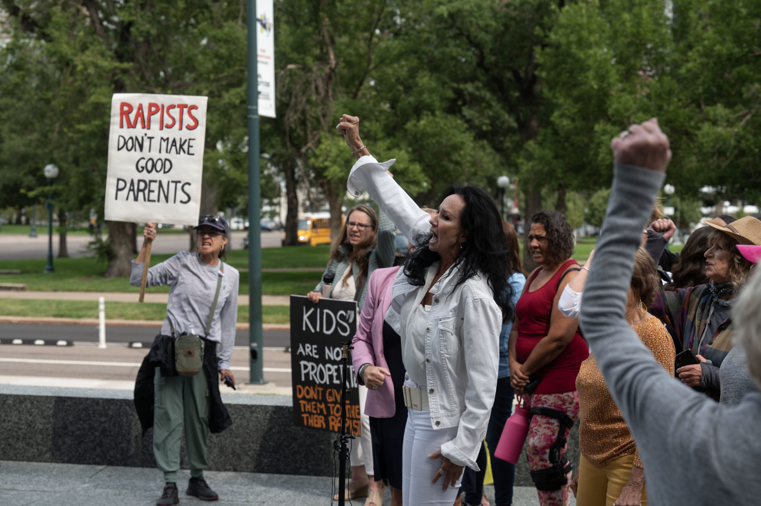 Maralee McLean, Executive Director of Mom’s Fight Back, leads a chant during a rally calling for family court reforms outside the Ralph L. Carr Colorado Justice Center in Denver on Thursday, Sept. 5, 2024. (Stephen Swofford, Denver Gazette) (Stephen Swofford Denver Gazette)