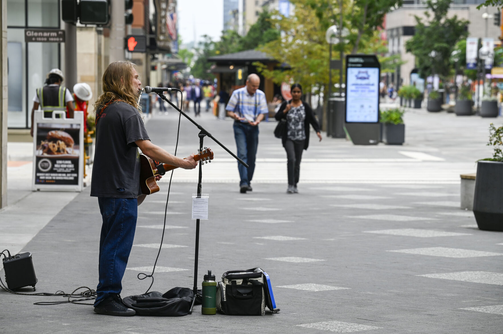 Greg Porch busks on 16th street on Tuesday, July 29, 2025. (Stephen Swofford, Denver Gazette) (Stephen Swofford)