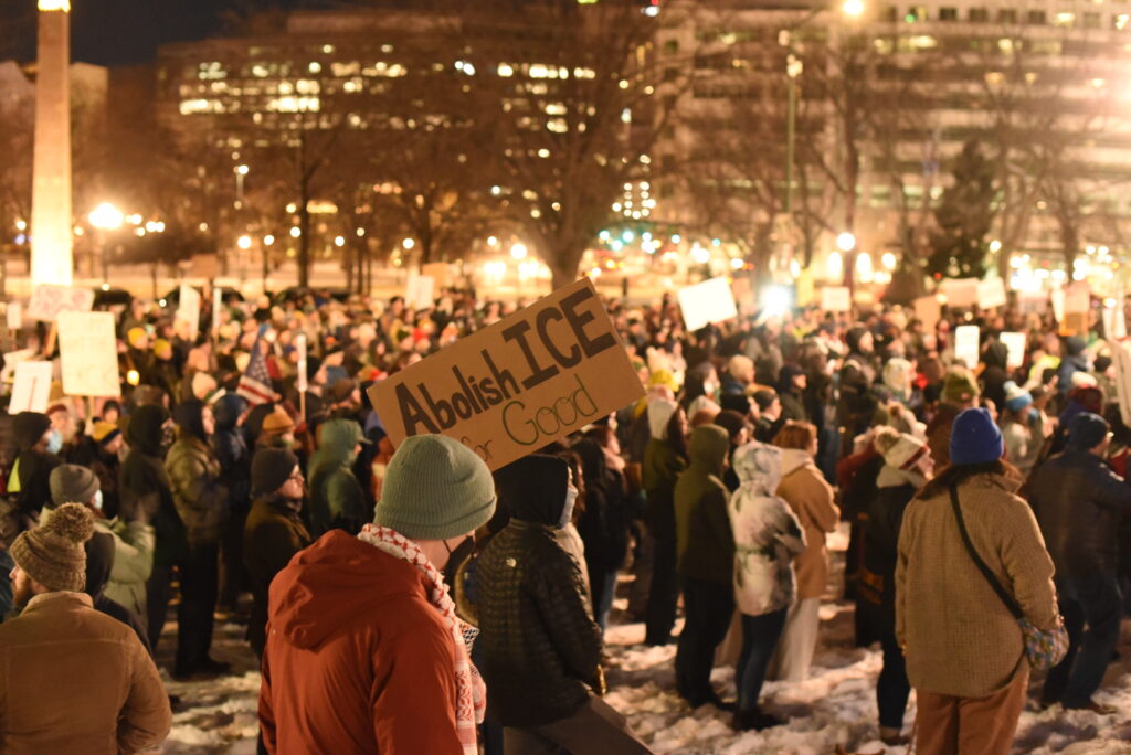 A large group of people gathers