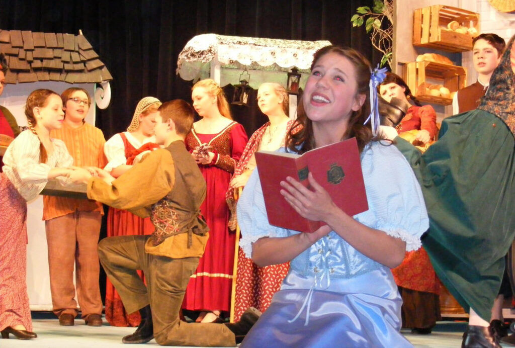 Janelle Orsborn as Belle in a 2013 Northglenn Youth Theatre production of 'Beauty and the Beast.' (Provided by Kimberly Jongejan)