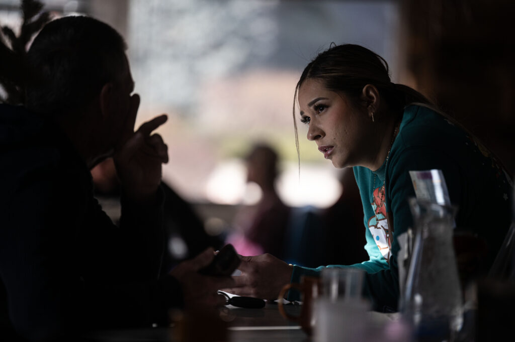 Jennifer Diaz Pedrisco talks with a customer from behind the counter at Davie’s Chuck Wagon Diner on Wednesday, Dec. 17, 2025. (Stephen Swofford, Denver Gazette)