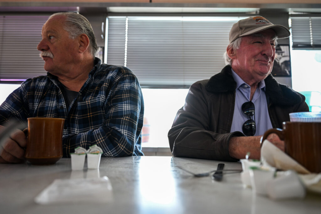 LeRoy Barton, left, and Steve Burnett joke with each other over a cup of coffee at the counter of Davie’s Chuck Wagon Diner on Wednesday, Dec. 17, 2025. (Stephen Swofford, Denver Gazette)