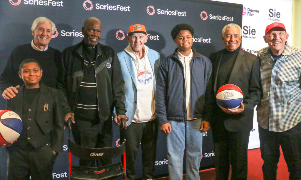 Former Nuggets great Ralph Simpson attends a screening of ‘Soul Power’ Feb. 18, 2026, at the Sie FilmCenter with former Nuggets coach George Karl and two Simpson grandkids, CJ and Eric. To the right are former players Chuck Williams and Steve Chubin. (John Moore, The Denver Gazette)