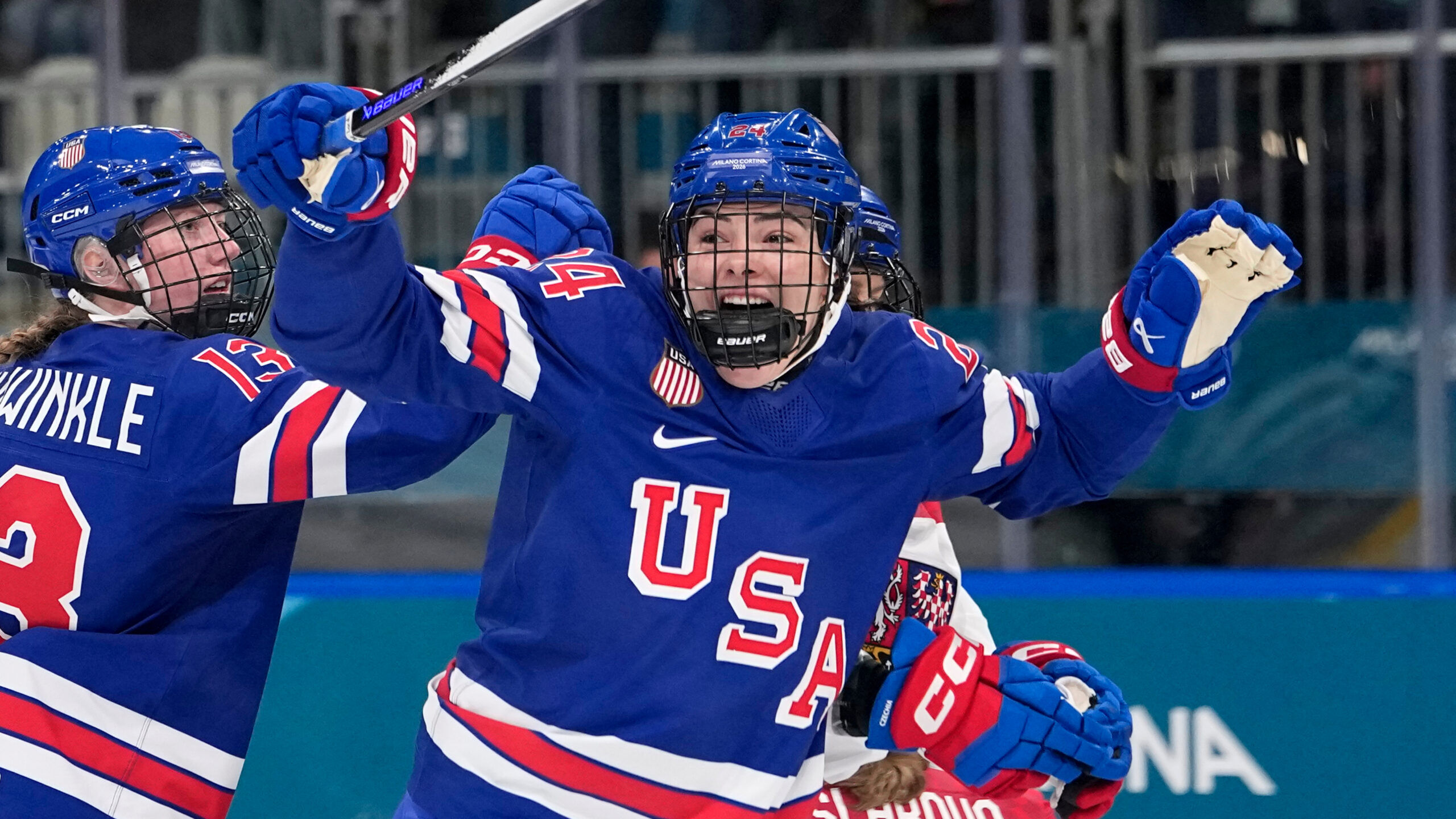 Mark Kiszla: How little hug between U.S. hockey hero and toddler gave Olympics its first big goosebumps moment