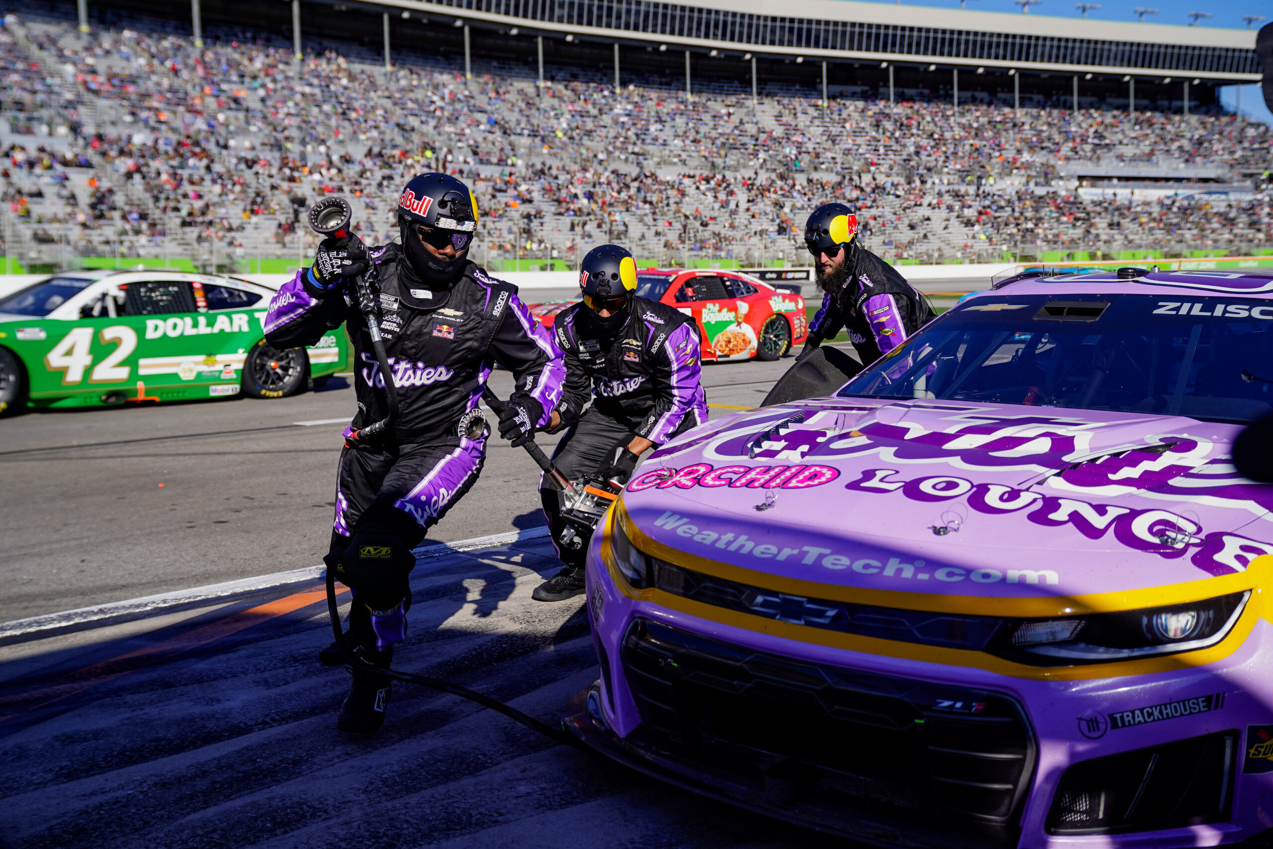 Ex-Broncos safety Josh Bush now a 'NASCAR guy,' changing tires on