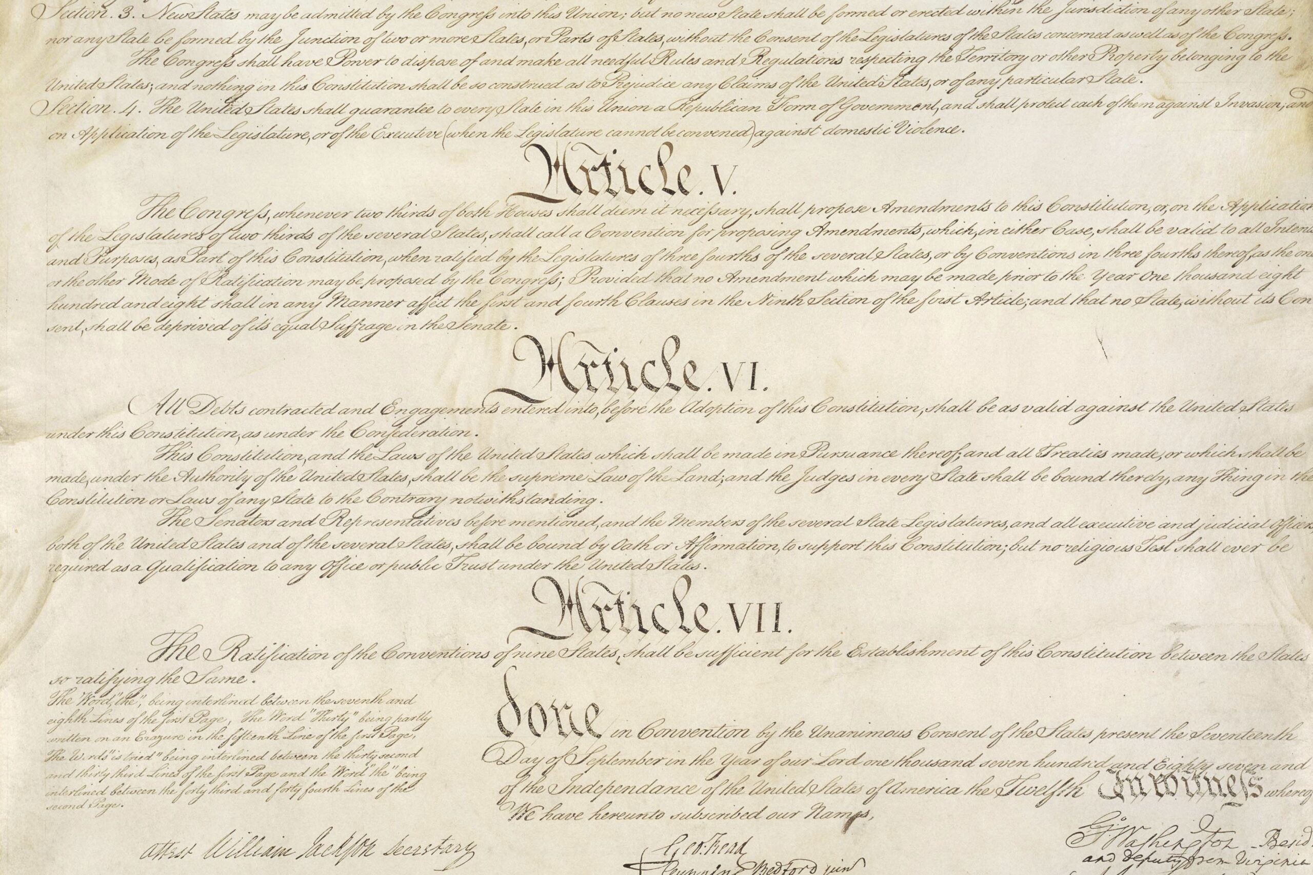 This photo made available by the U.S. National Archives shows a portion of the United States Constitution with Articles V-VII. For the past two centuries, constitutional amendments have originated in Congress, where they need the support of two-thirds of both houses, and then the approval of at least three-quarters of the states. But under a never-used second prong of Article V, amendments can originate in the states. (National Archives via AP)